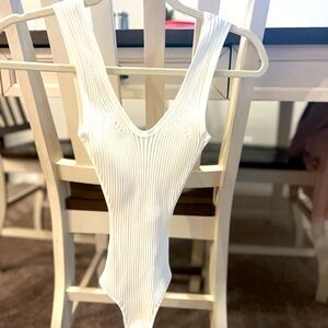 KHAITE White Body Suit